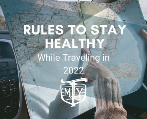 Rules To Follow To Stay Healthy While Traveling in 2022 mother trucker yoga blog cover image travel fitness